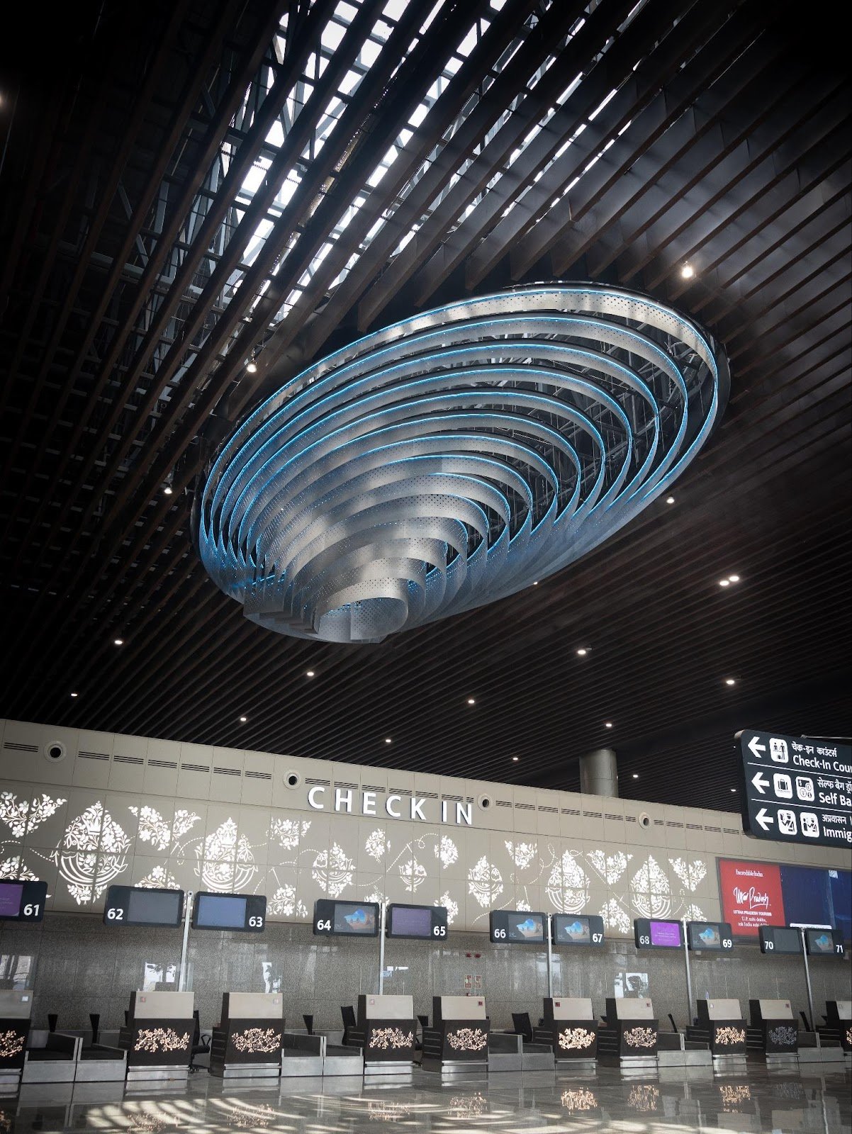 Parametric aluminium skylight ceiling at Chaudhary Charan Singh International Airport, Lucknow, inspired by the Rohu fish