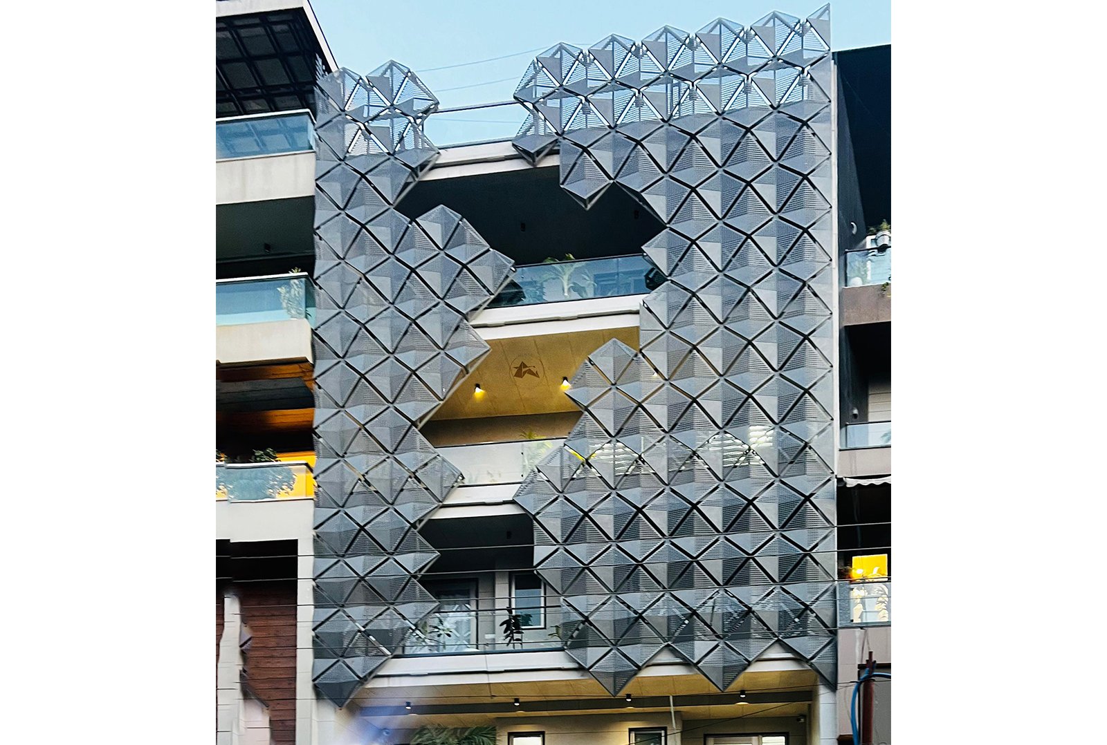 Axes in Excess: Setting new standards in custom parametric metal facade solutions for buildings.