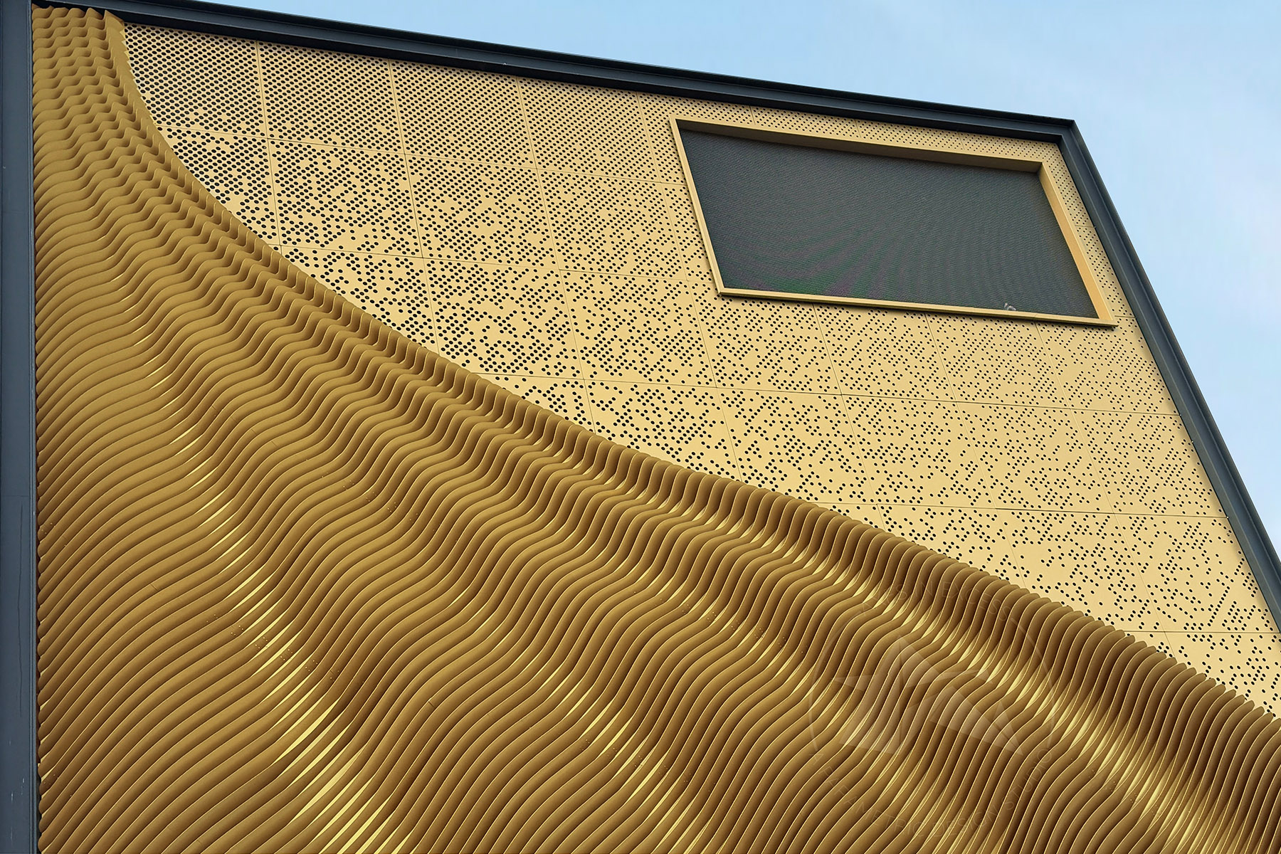 Parametric gold metal facade at standard hardware in Indore, designed by Axes in Excess