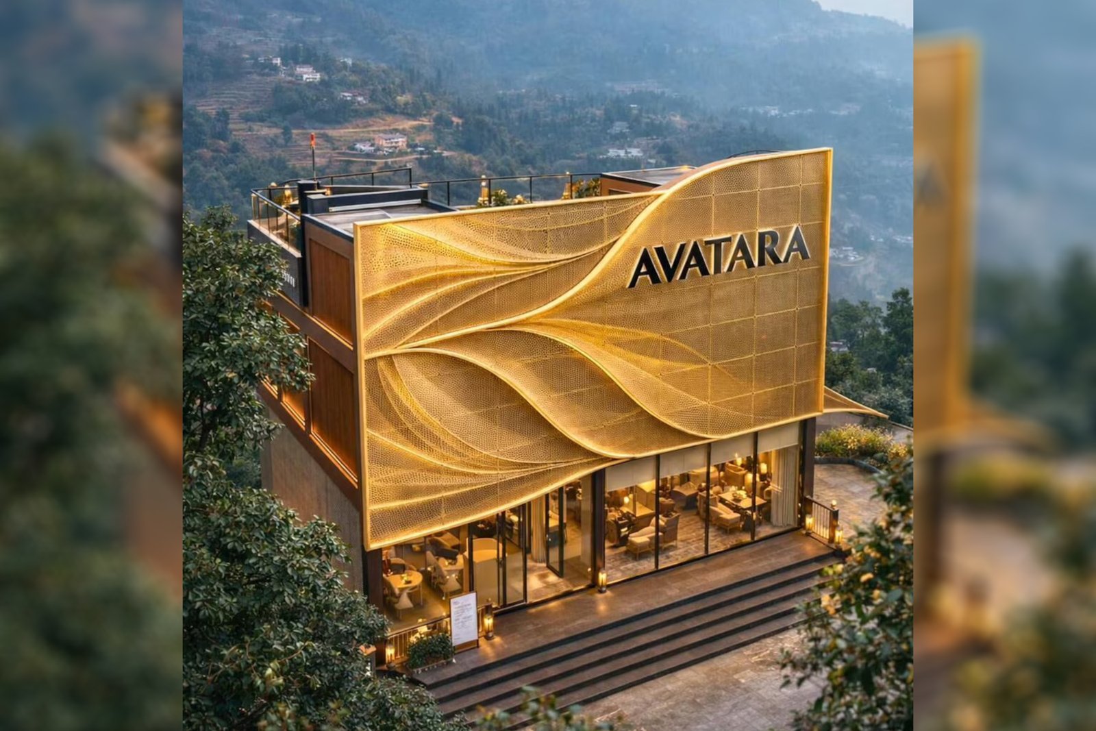 Curved aluminium facade panels creating wind-inspired effect