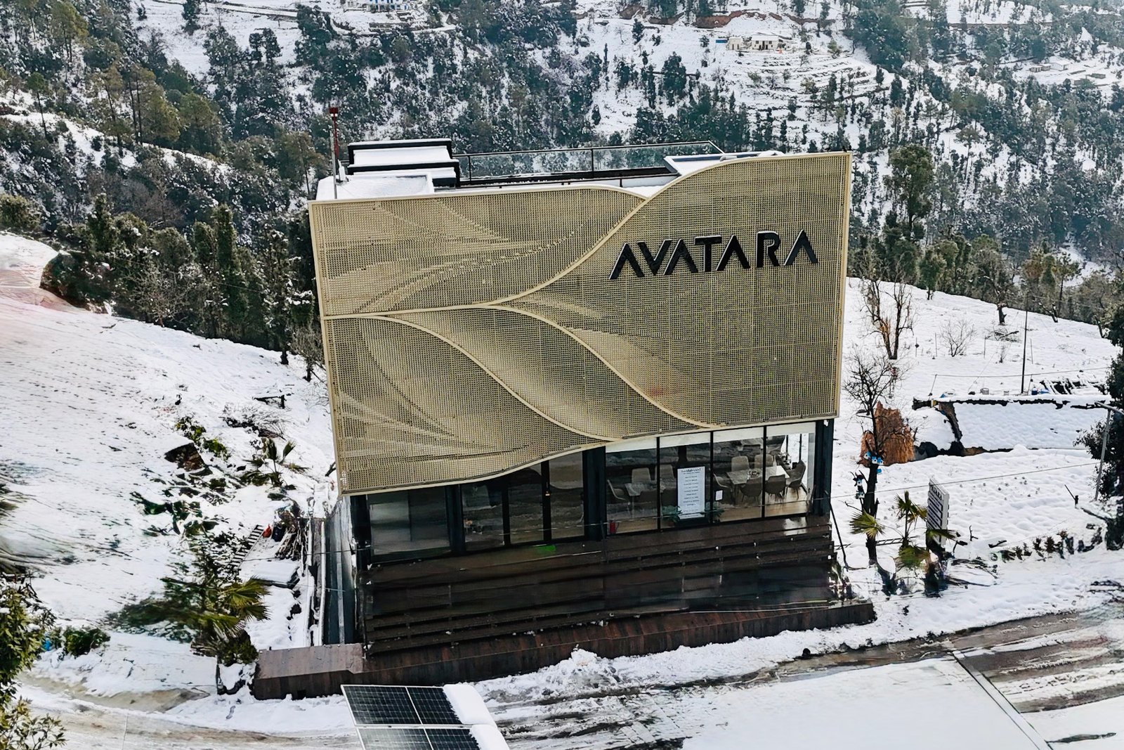 Luxury hotel facade with Himalayas mountain backdrop by axes in excess