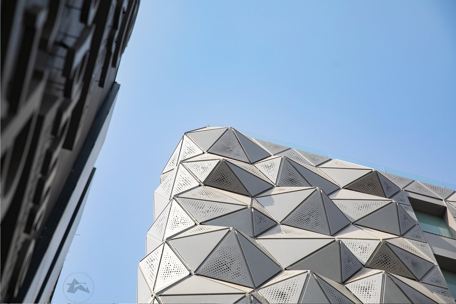 Origami inspired metal facade system in Ajmer hotel axes in excess 