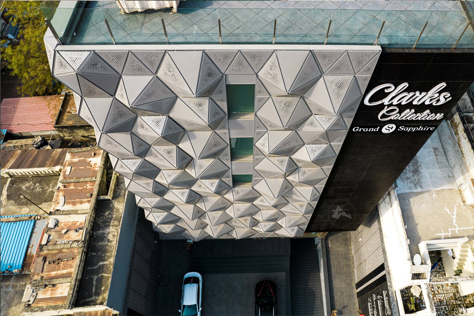 Parametric facade lighting effect on perforated panels by axes in excess