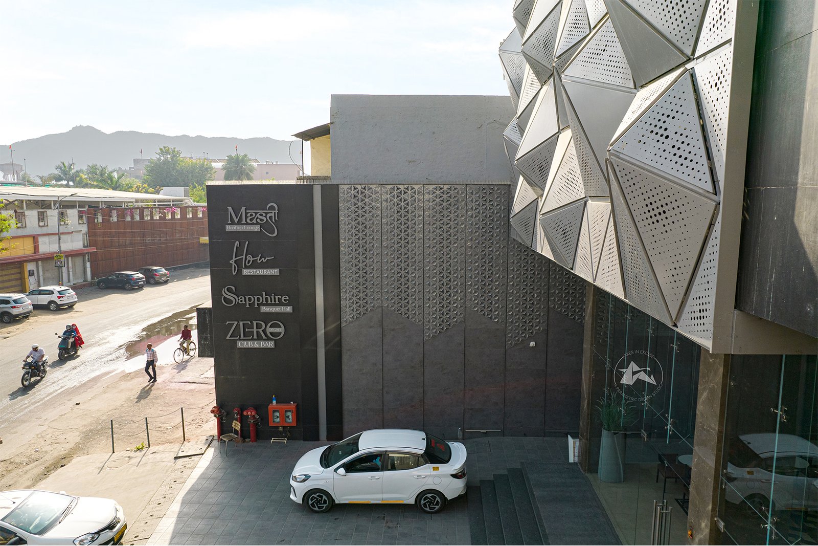 blossom pattern metal screen cladding by axes in excess