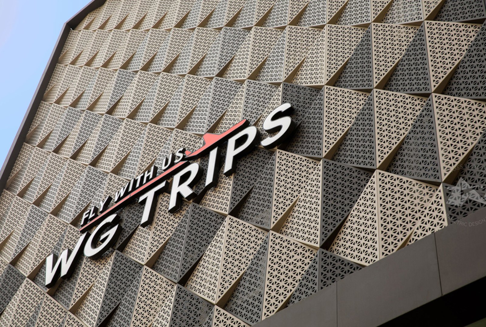 Metal facade design in Ajmer with triangular perforated panels