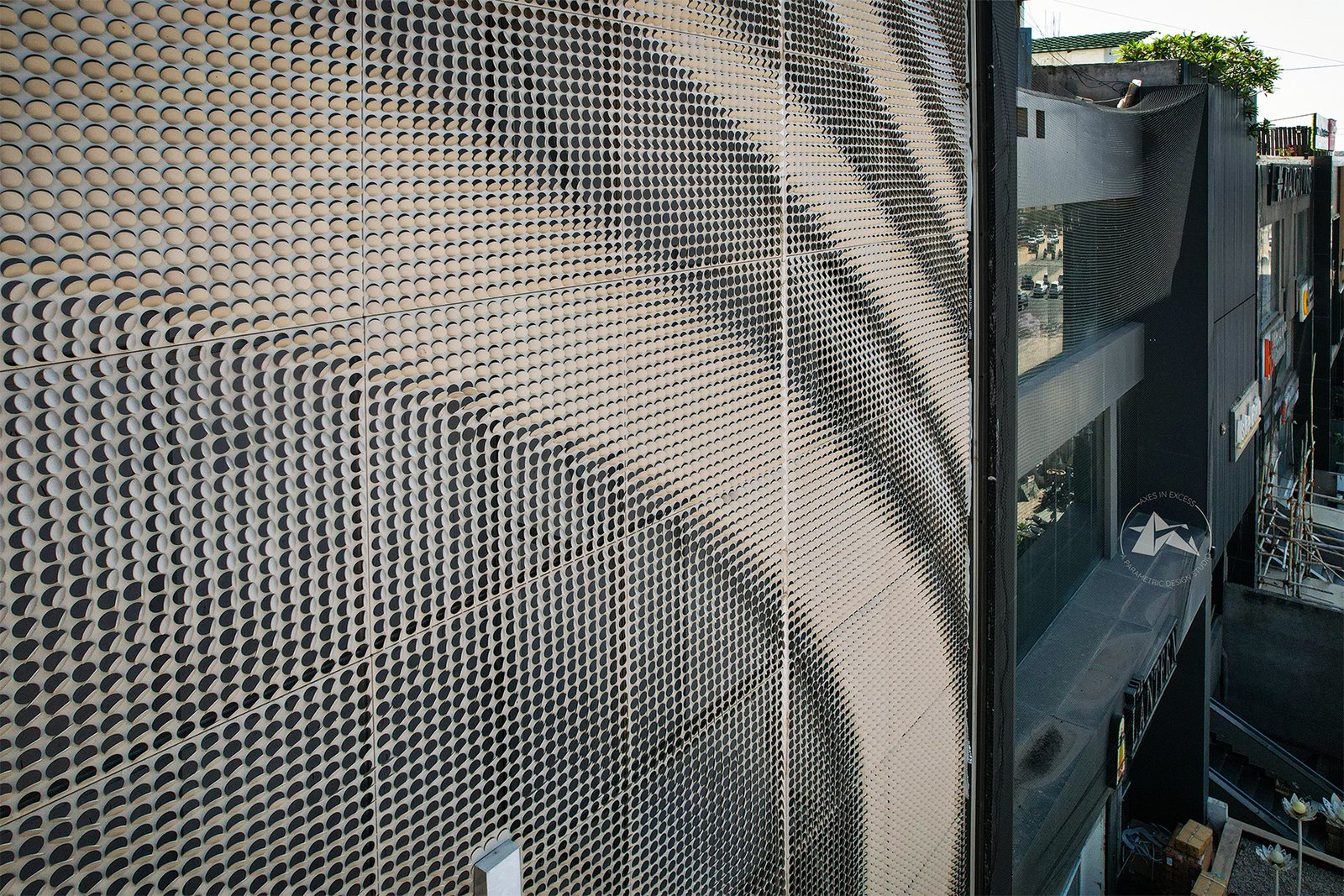 Architectural metal facade screen for commercial exterior