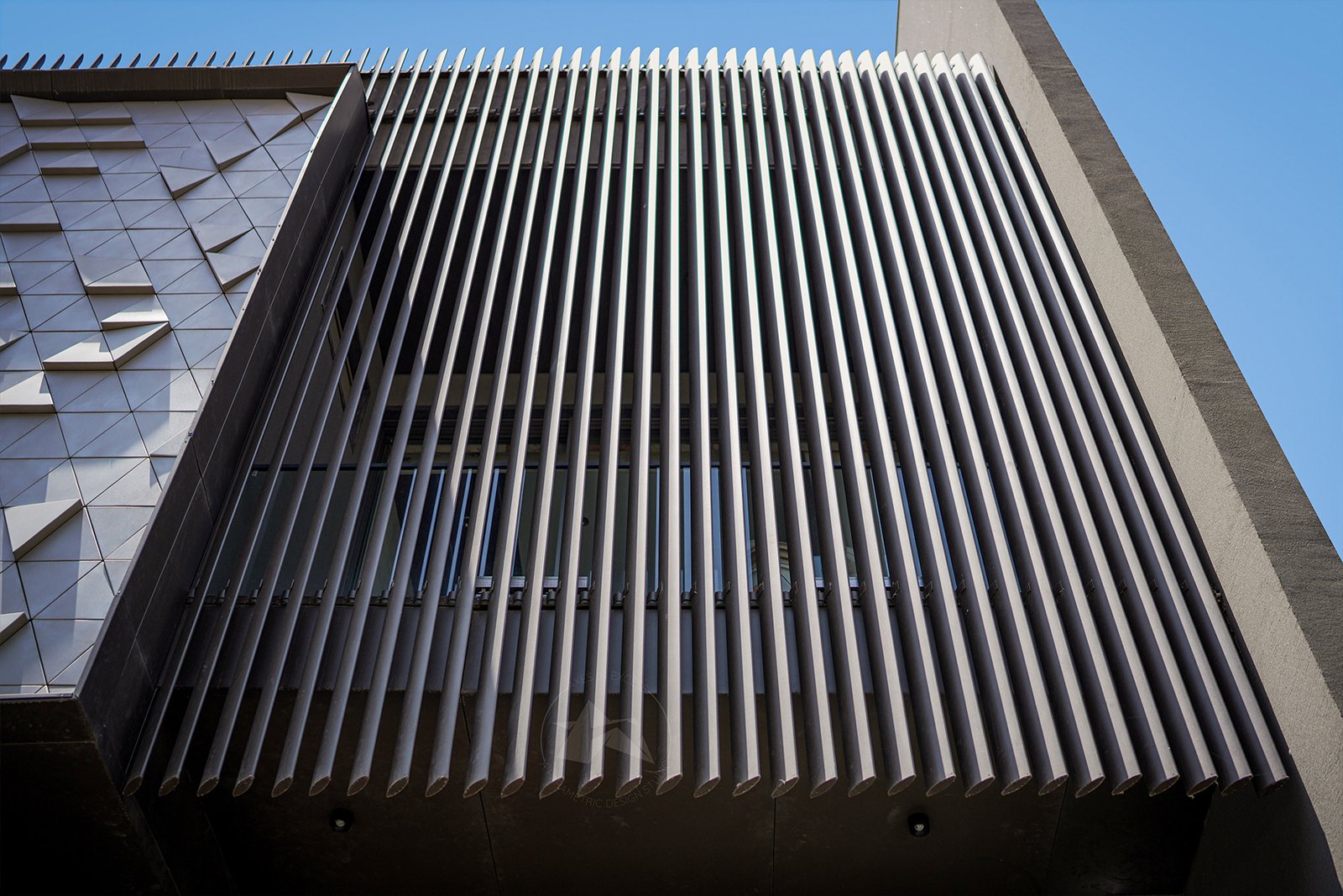 Contemporary house facade using TriGrid DiamondFormation panels