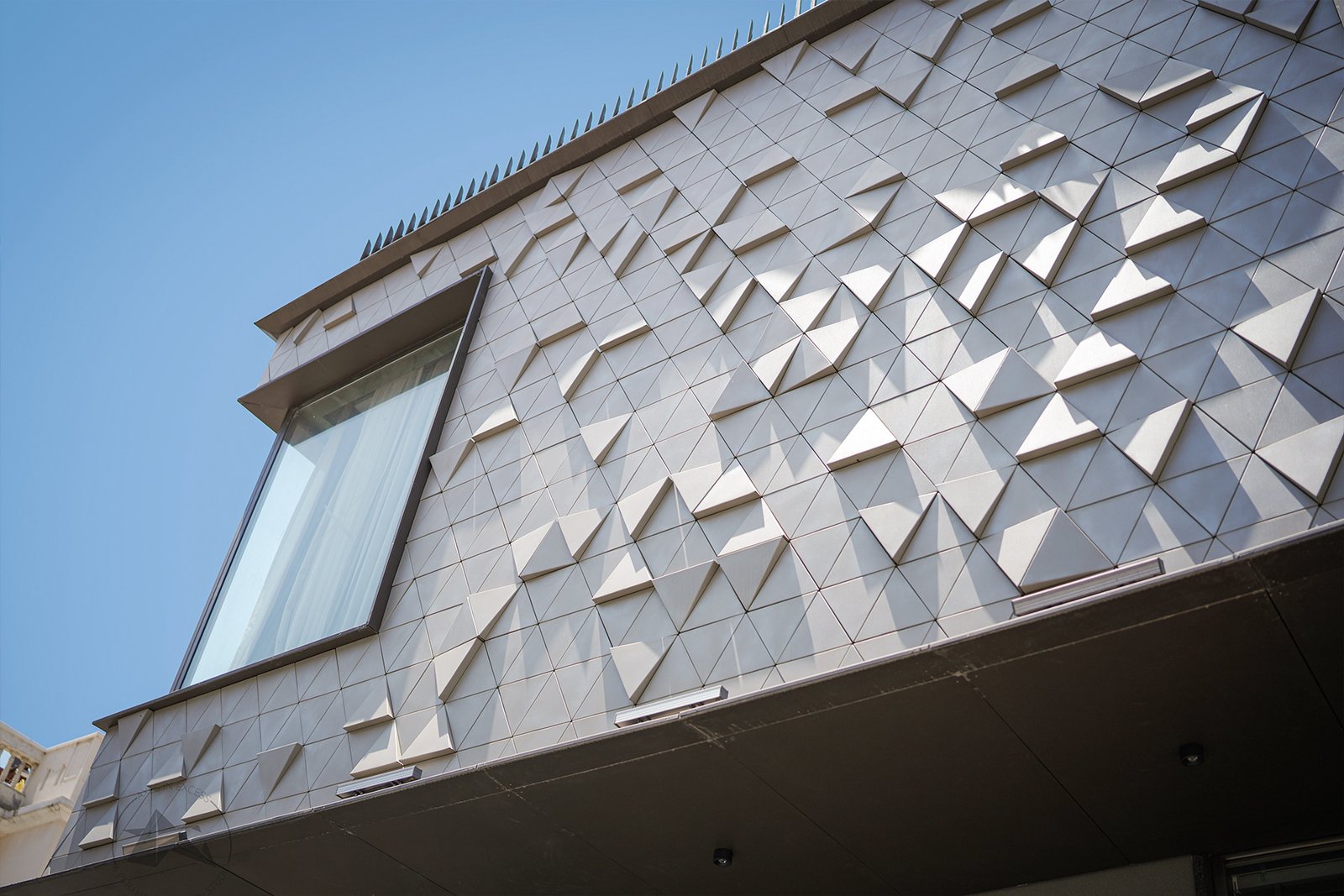 Parametric residential facade with random 3D box design