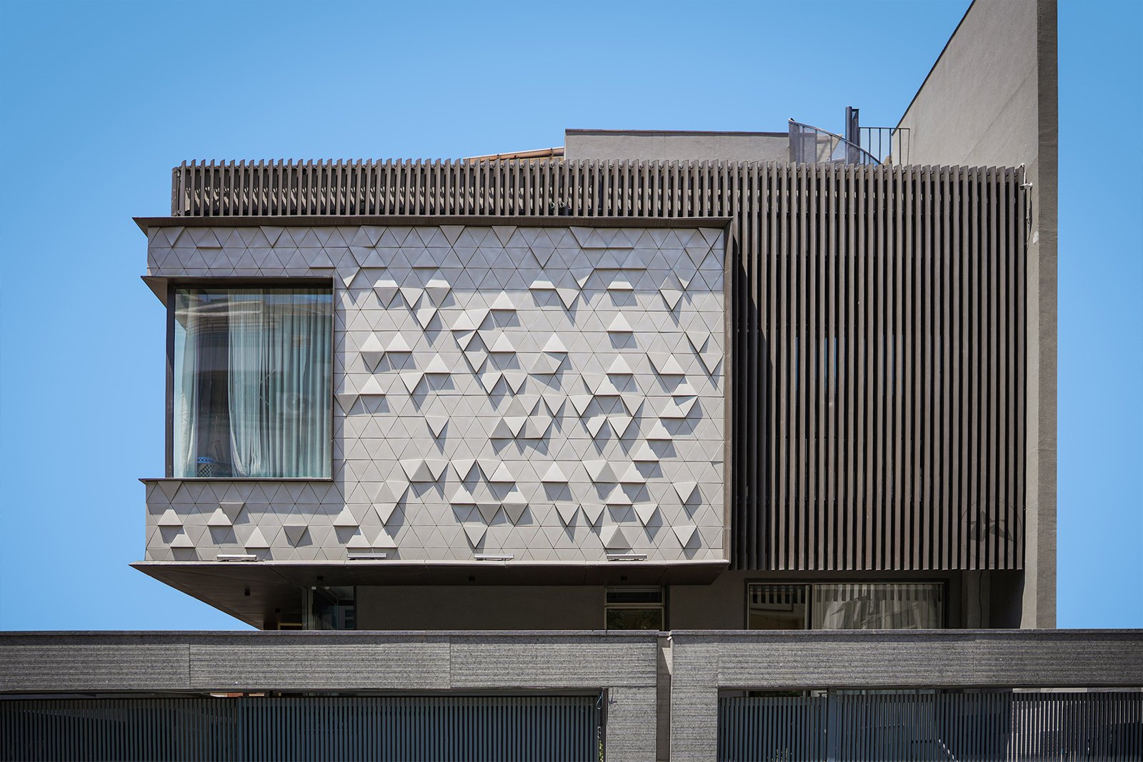 Modern villa facade with geometric 3D elevation design