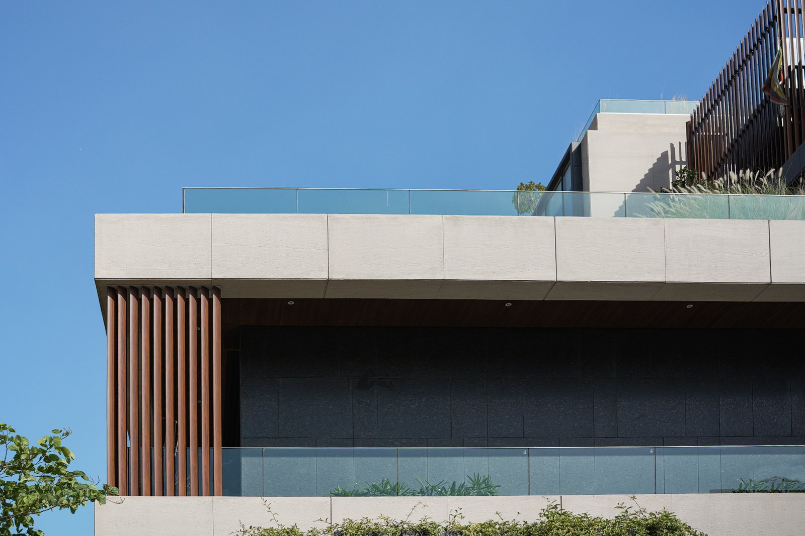 Contemporary bungalow facade with Aero Foil louvers