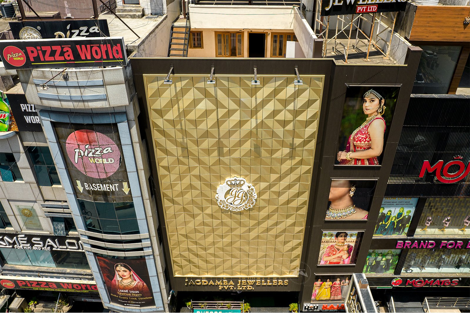 Elegant gold metal facade with EchelonCraft 3D panels by axes in excess
