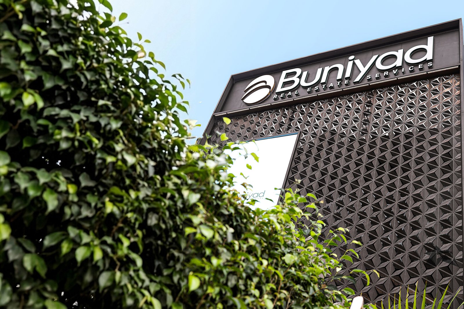 Modern office building elevation with architectural metal facade