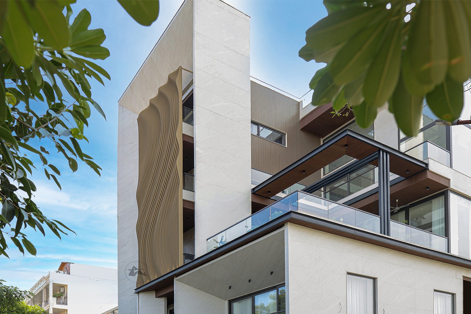Contemporary residential elevation with parametric metal facade