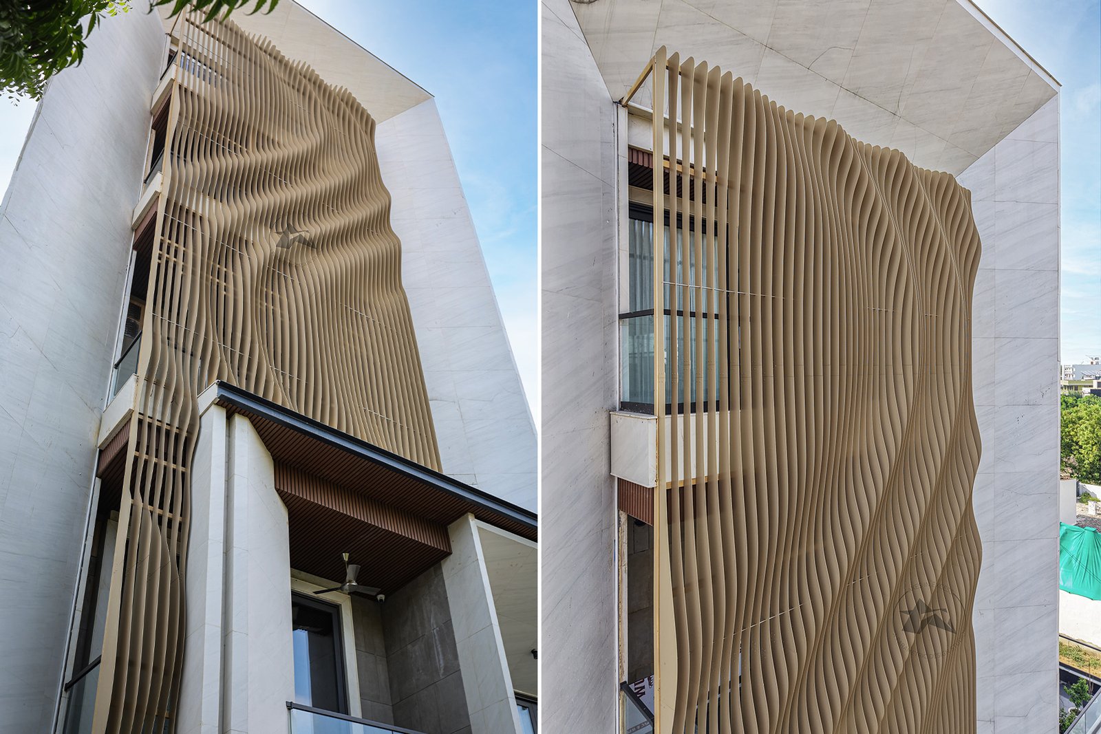 Floating curved aluminium fins on modern house facade