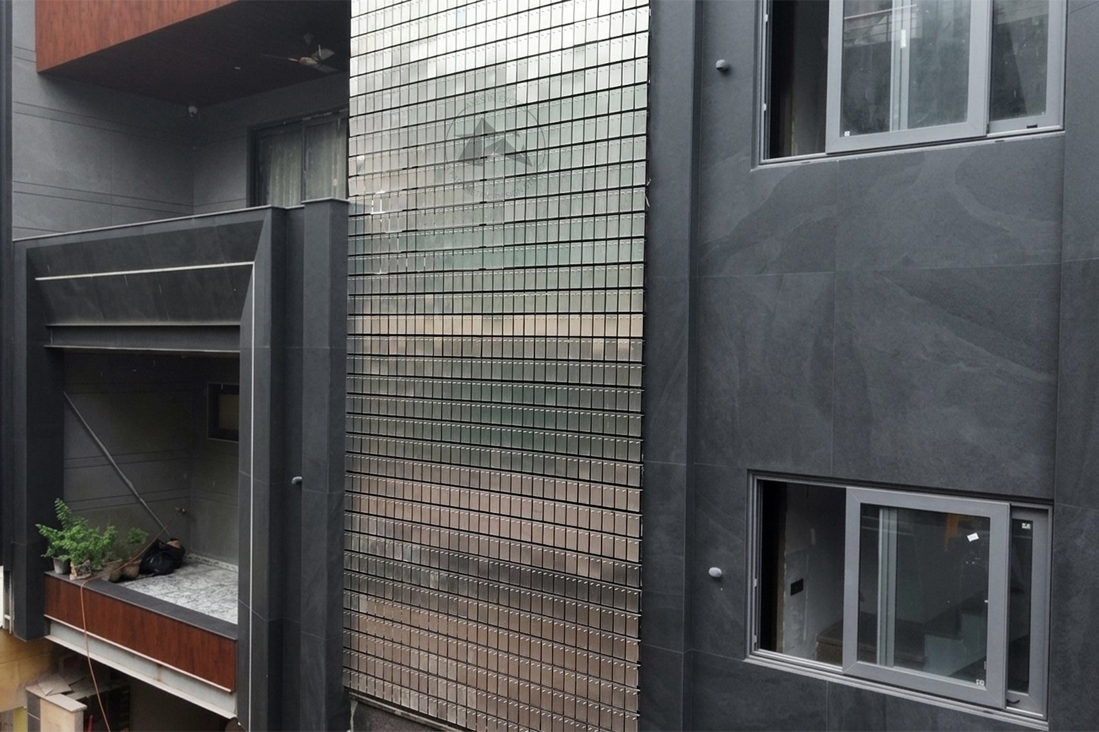Modern residential elevation with kinetic screen